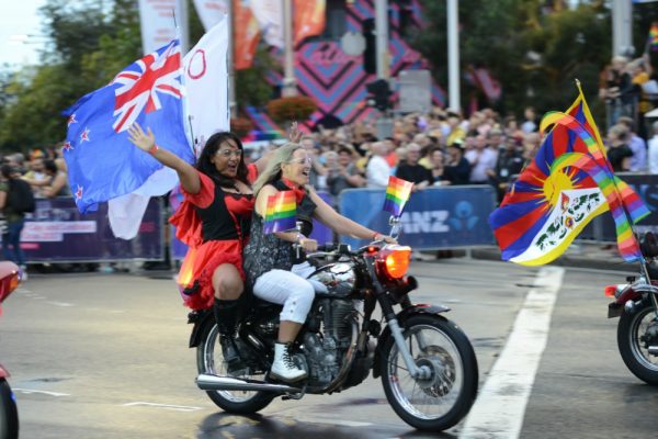 Sydney Gay and Lesbian Mardi Gras two women on a bike by Jeffrey Fong