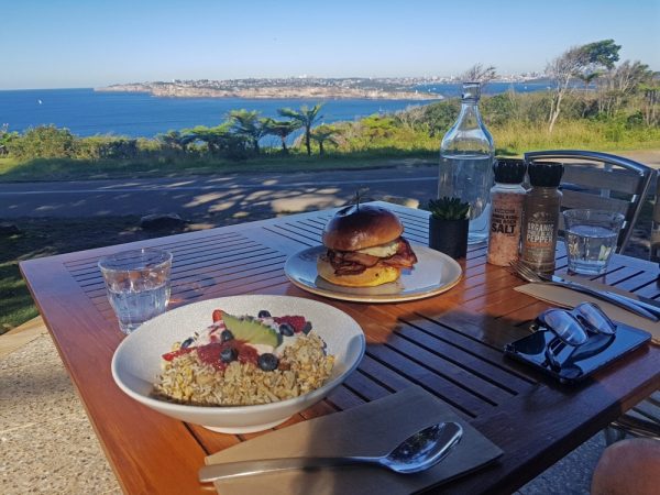 Breakfast burger and Bircher with a view of the harbour