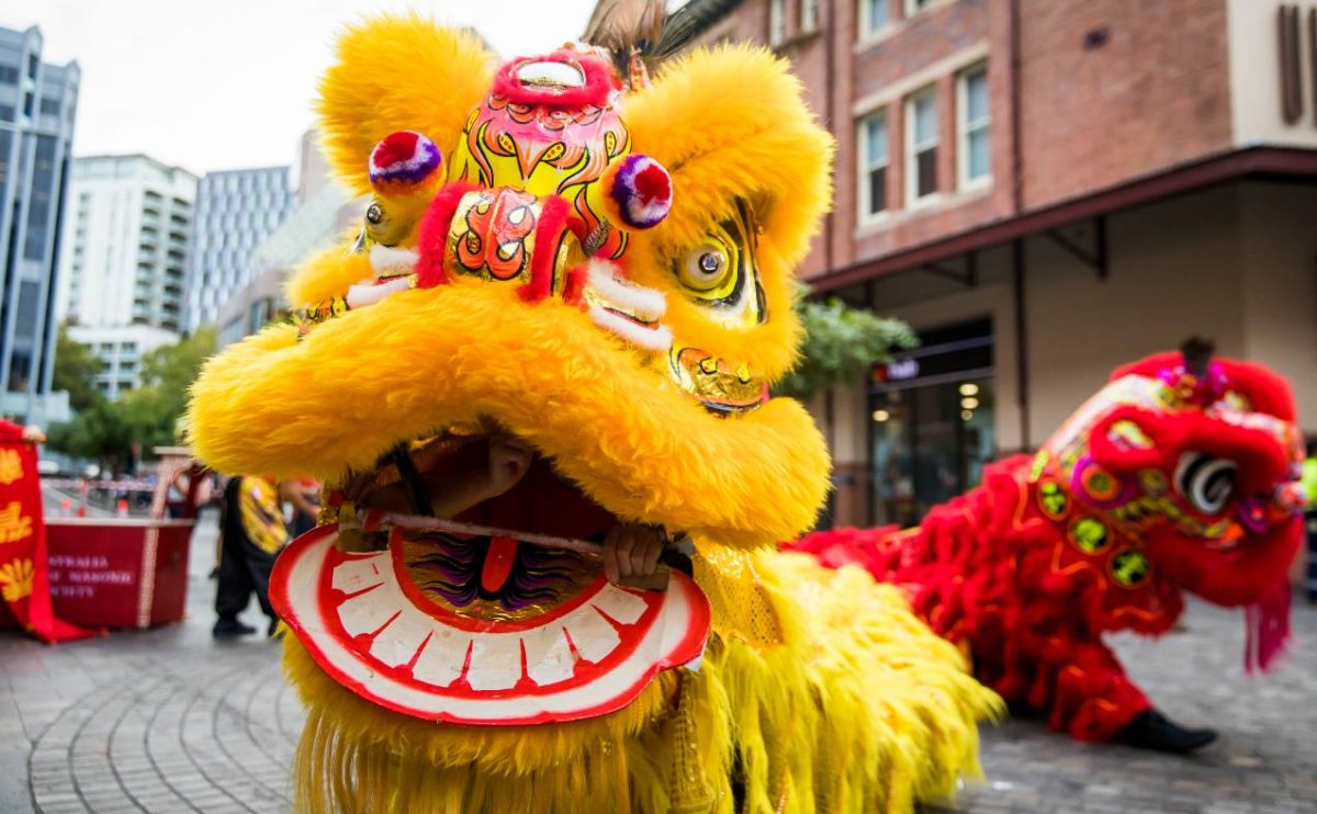 Lion dancer performing in Chinatown, Sydney during Chinese New Year 2018.