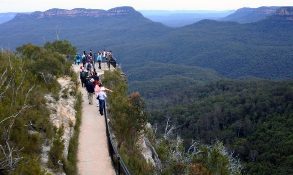 Aerial view of people visiting Prince Henry Cliff Walk in Katoomba over looking at the Jamison Valley in the Blue Mountains in New South Wales, Australia.