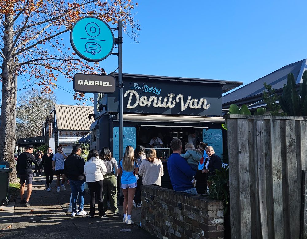 Berry Donut Van with a crowd waiting for hot coffee and donuts