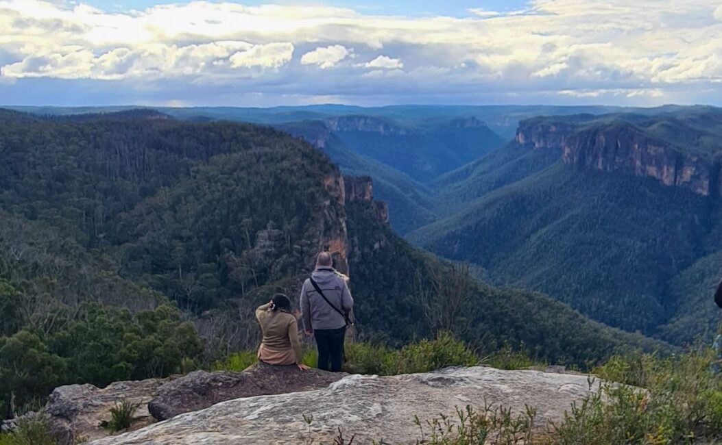 Couple taking in Blue Mountains valley view
