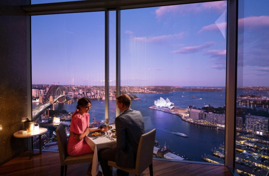 couple dining with a view of Opera House and Sydney harbour Bridge