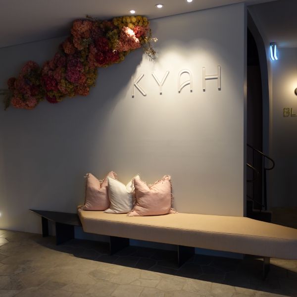 entry area at Kyah hotel with lounge and cushions
