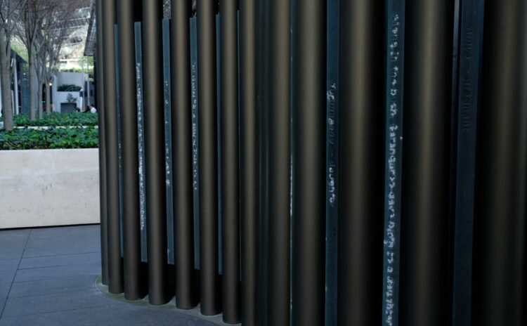 The artwork Beacon at Barangaroo - bronze-anodised aluminium tubes reminiscent of organ pipes. 