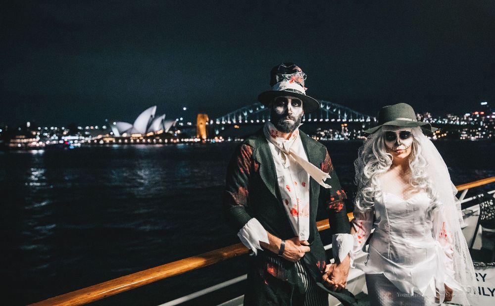 a zombie bride and groom on a Halloween Cruise in Sydney