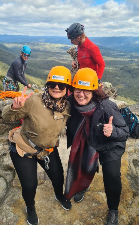 me and a friend abseiling for the first time in the blue mountains