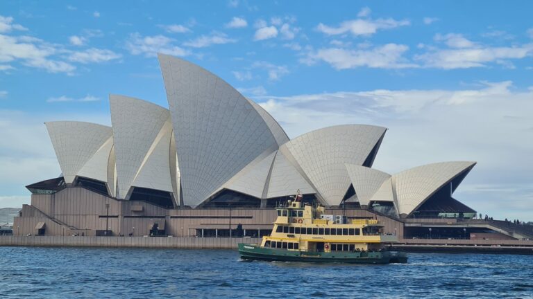 Sydney Opera House with a Ferry