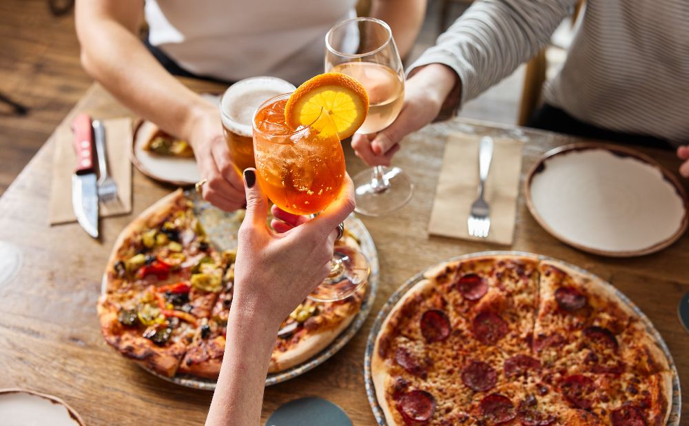 Pizza and drinks at Crossroads Casula