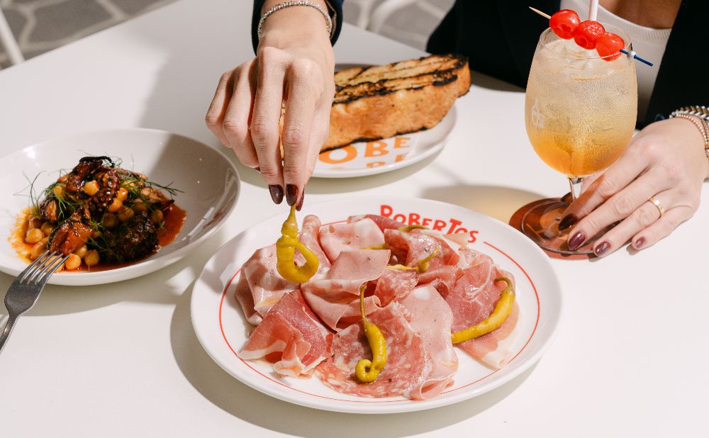 Robertos_ANTIPASTO Prosciutto San Daniele, mortadella, fennel salami, guindillas, focaccia + GRILLED OCTOPUS (GF) Nduja vinaigrette, chickpeas, oregano_Cr James Pellegrino (1)