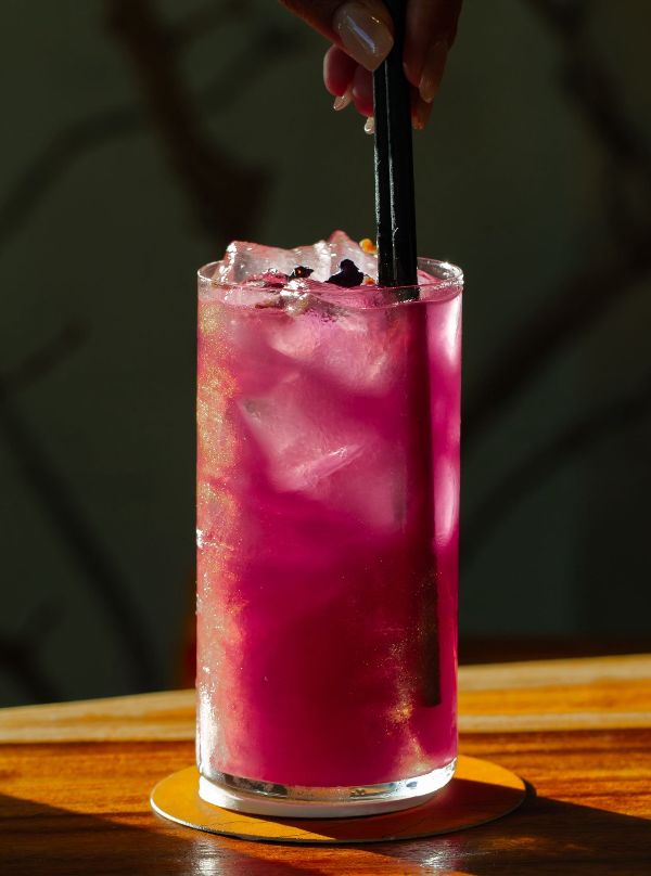 Callao's Vivid cocktail, the Sakura Eclipse - made with Sochi, lychee liquor, elderflower liquor, butterfly pea and pear syrup.