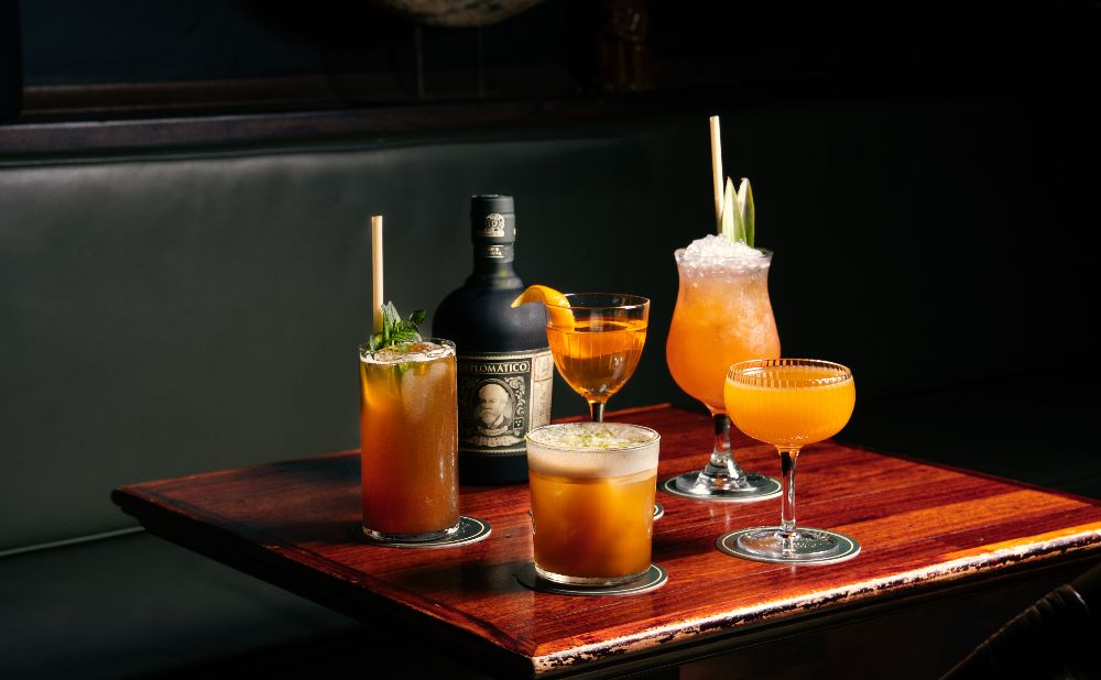 A table of 5 Diplomático Rum drinks at Old Love's