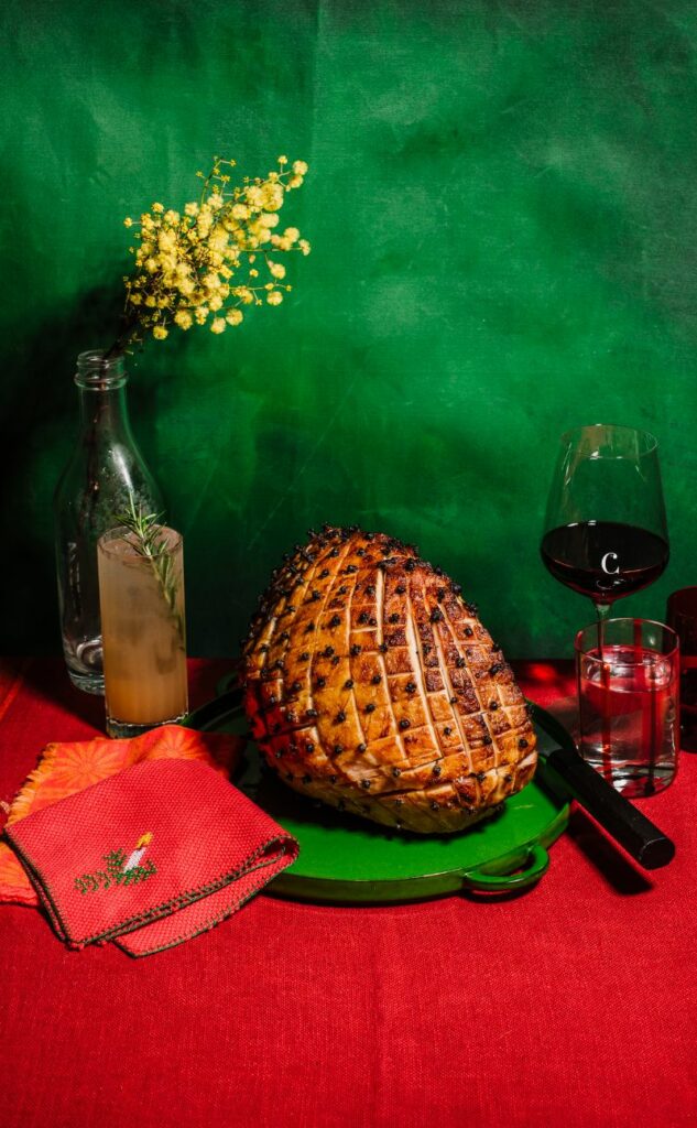 Roast ham on a red tablecloth