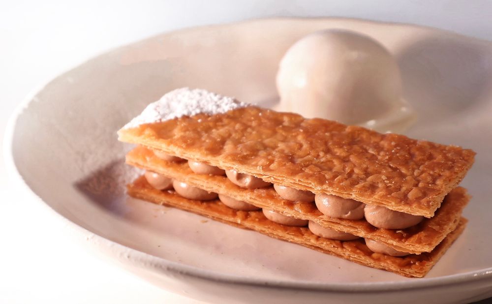 Pistachio Mille Feuille pastry with cream and sorbet