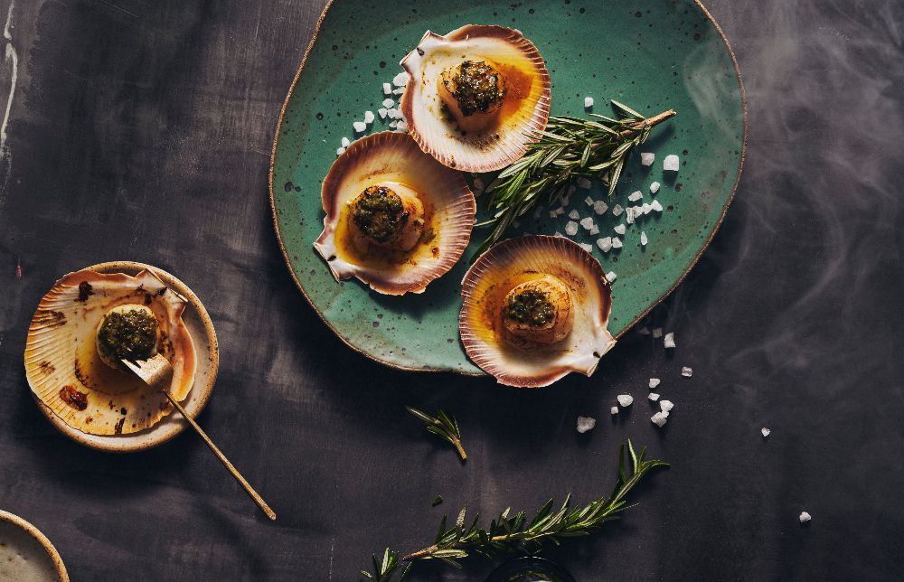 Abrolhos Islands scallops on a green plate 