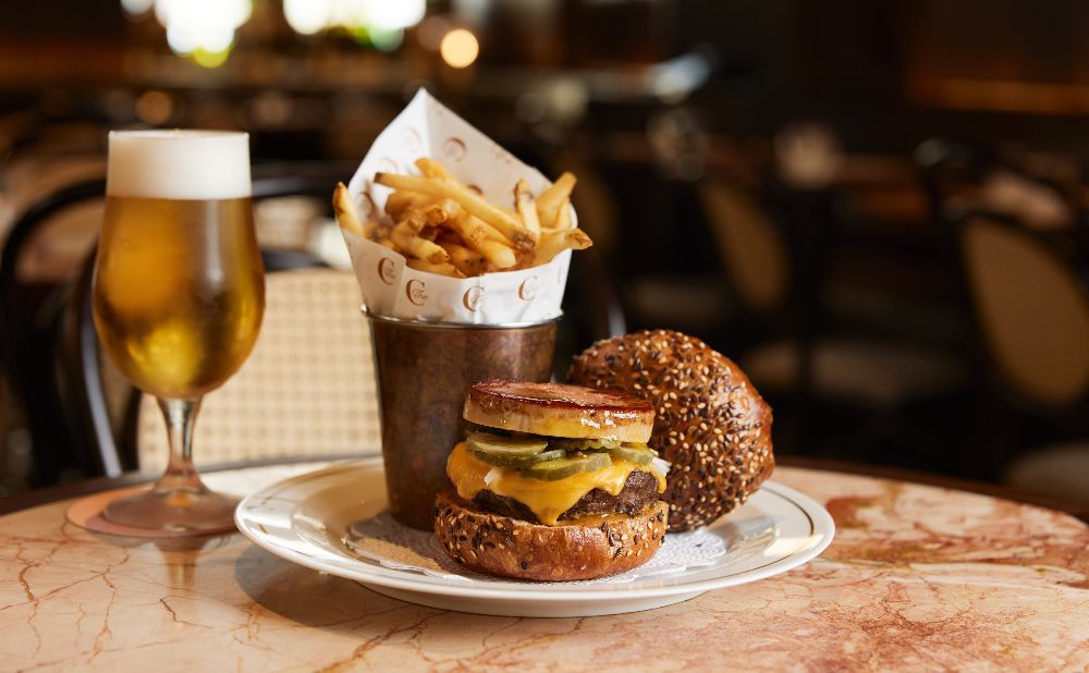Beer, fries and a wagyu cheese burger where the cheese is one of the stars