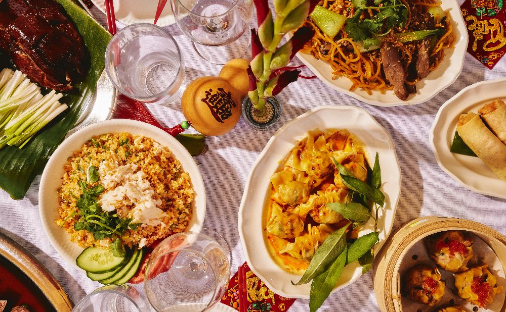 a table laden with Asian meals for Lunar new year in Manly 