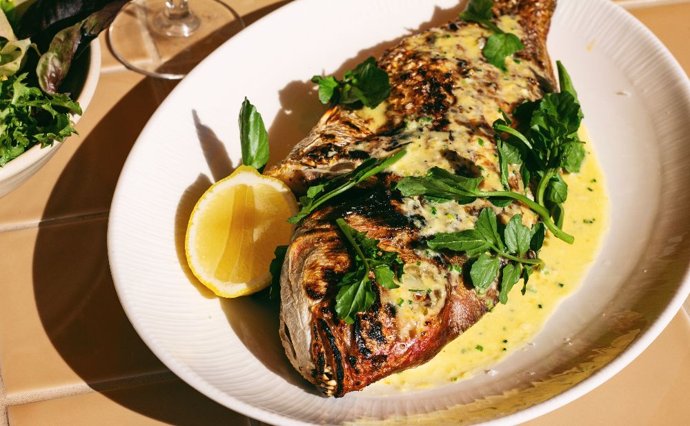 Whole fish on white plate at North Bondi FIsh