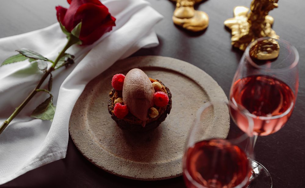 Plated steak dish at BLACK Bar & Grill with garnish