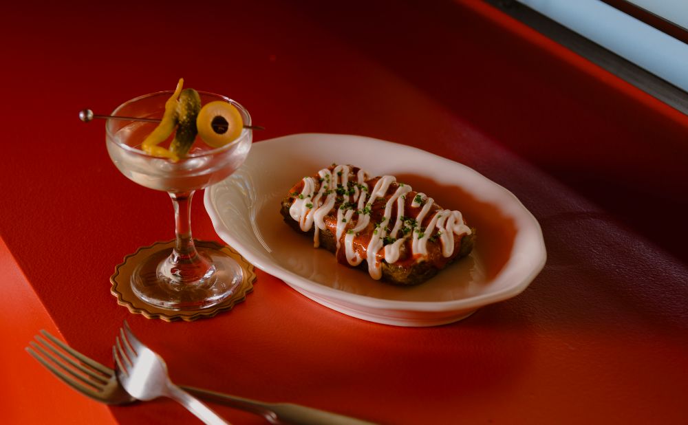 Crispy potatoes, spicy bravas sauce and aioli. Cocktail La Valencia , Credit Jiwon Kim