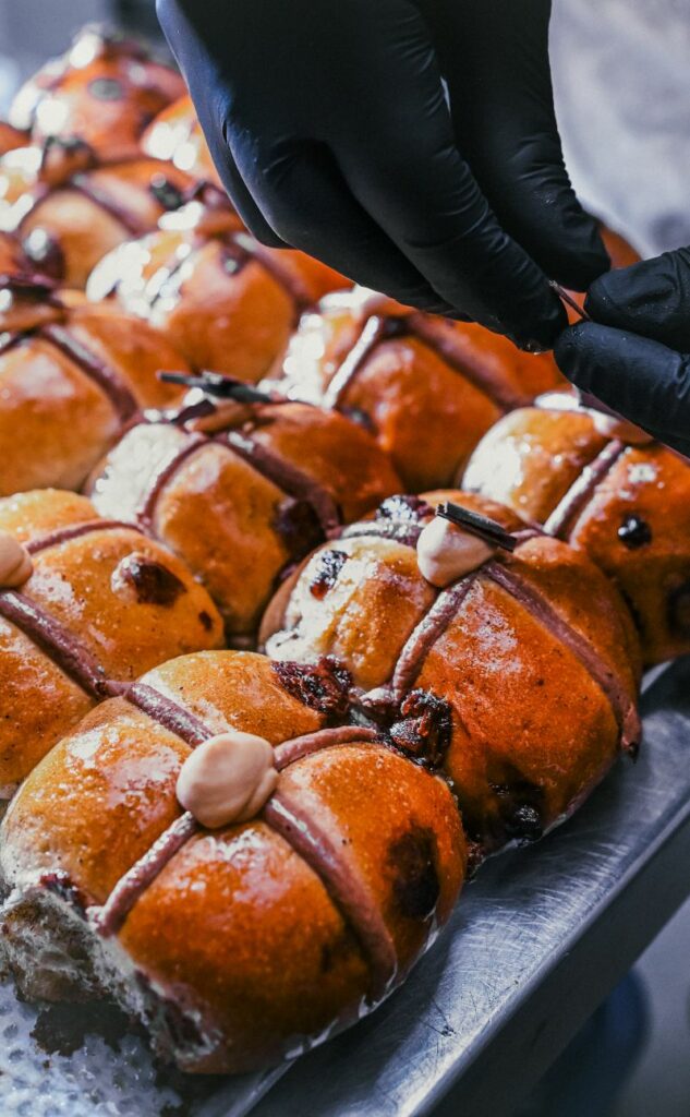 Dulce De Leche Hot Cross Bus — a chocolate bun filled with silky dulce de leche mousseline