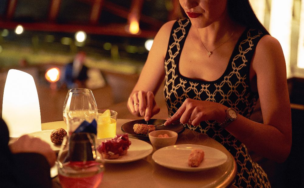 bar snacks and cocktails at Bennelong