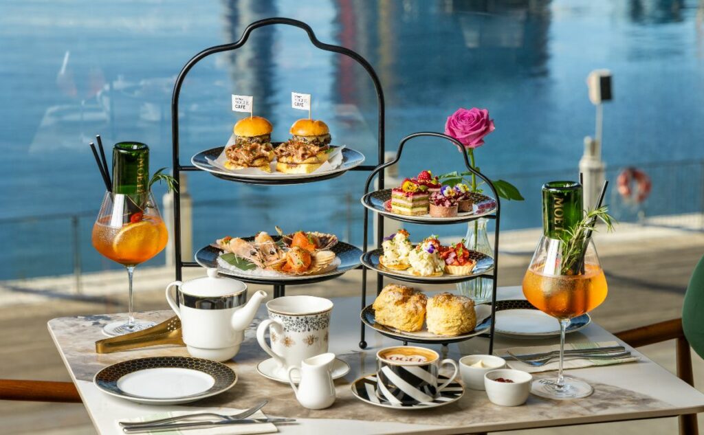 High Tea with a view featuring Lobster, seared king salmon and hokkaido scallops, wagyu royale slider