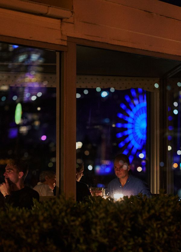 Blue Ferris Wheel viewed from Sails Lavender Bay