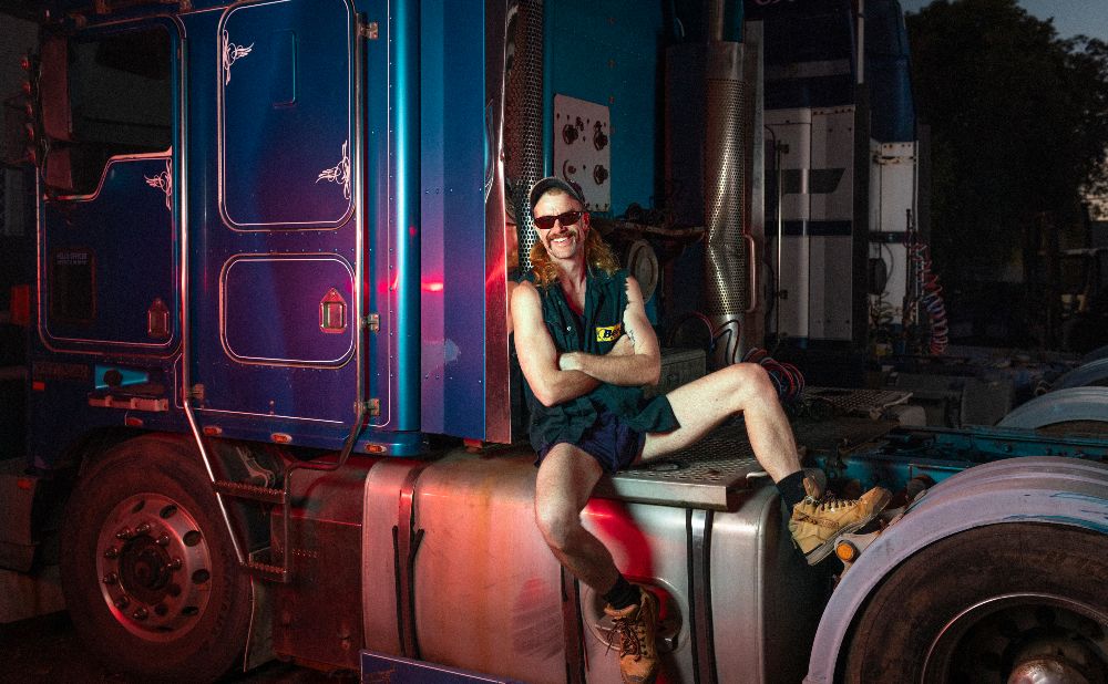 Jonny Hawkins portrait photographed at Coast to Coast heavy equipment, for promotion of 'Riding Shotgun' truck driver play