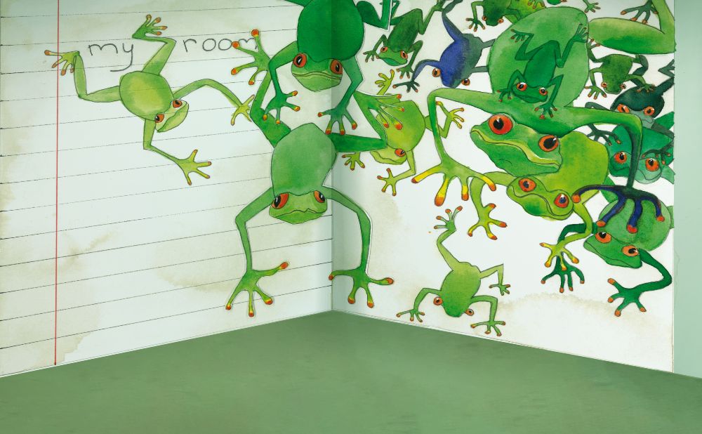 green frogs painted on a lined page - still from the book of everything