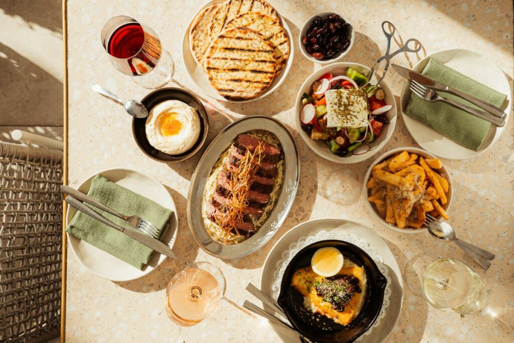 a spread of Greek food from Santorini Sunday at Ammos 