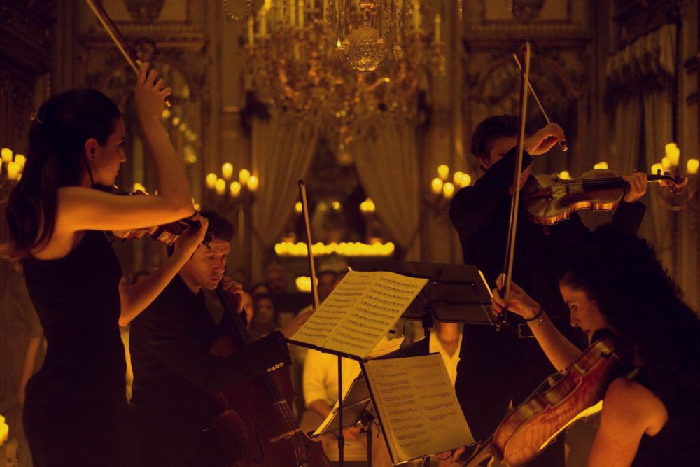 Violin players at a Candlelight performance in Sydney