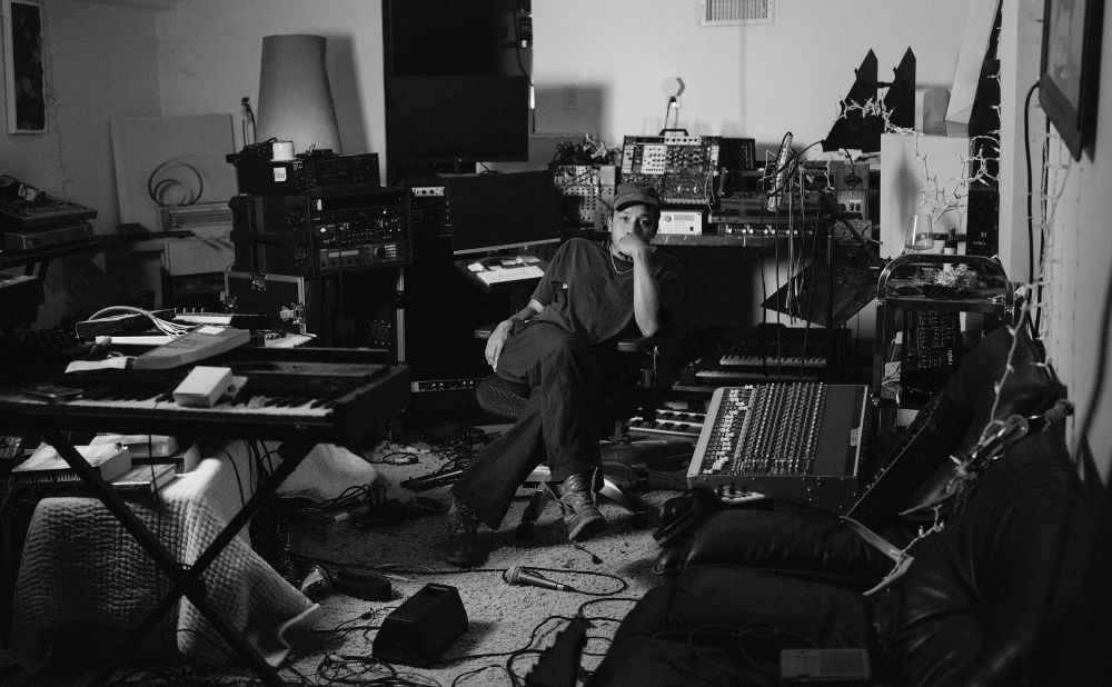 Photo of Dijon in a music studio