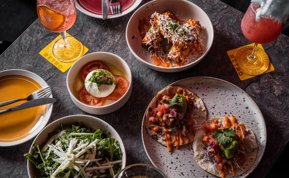 The menu at Retro Cronulla featuing burrata, tacos and enchaladas